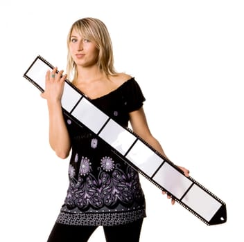 Sexy young woman folding film strip