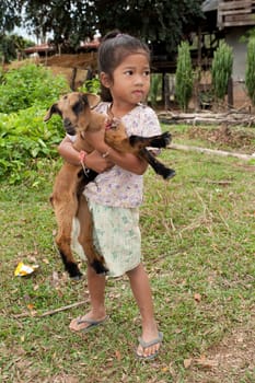 Asian girl with goat