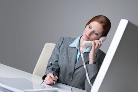 Successful business woman on the phone