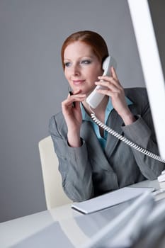 Successful business woman on the phone