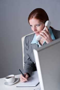 Successful business woman on the phone