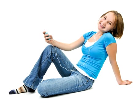 Teenage girl listening to music