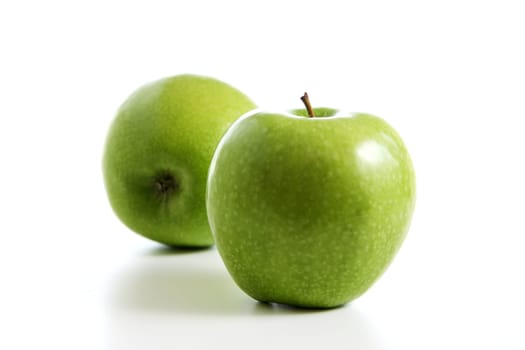 Two fresh green apples