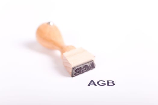 Wooden stamp with the word Terms & Conditions - Terms & Conditions