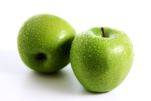 Two fresh green apples