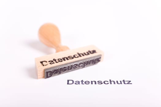 Wooden stamp with the word Privacy Policy