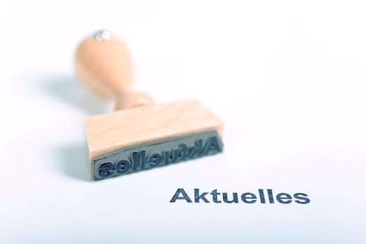 Wooden stamp with the word News