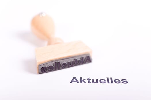 Wooden stamp with the word News