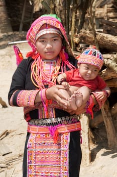 Akha woman with baby