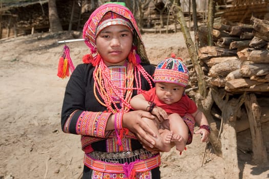 Akha woman with baby