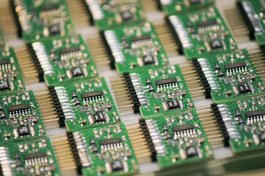 A stack of microchips lying on a table.