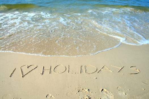 I love holidays - label on the beach