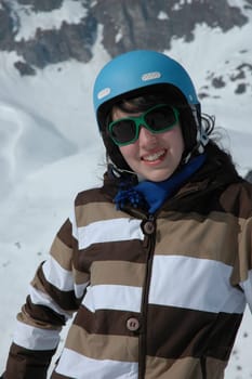 Teenager with ski helmet