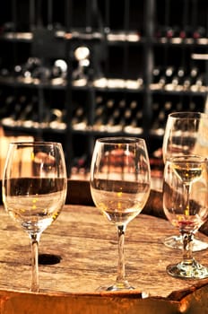 Wine  glasses and barrels