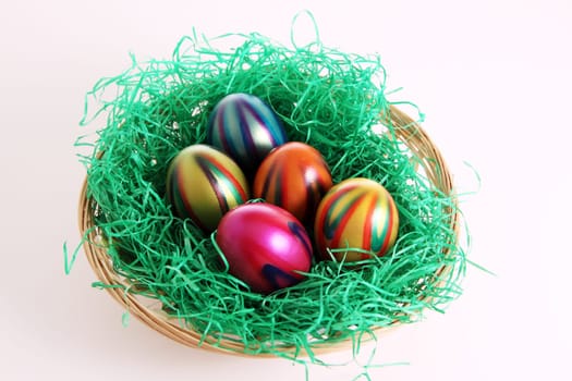Colorful Easter eggs in the Easter basket
