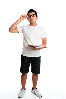 Man with a notepad and pen looking up