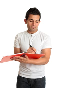 Man or student writing in a notebook