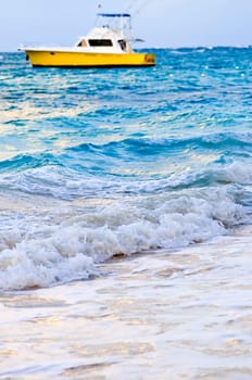Waves breaking on tropical shore