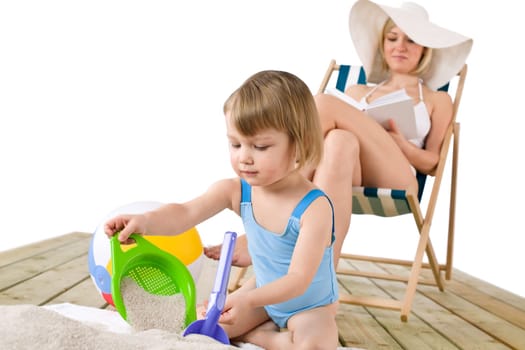 Beach - Young woman with child
