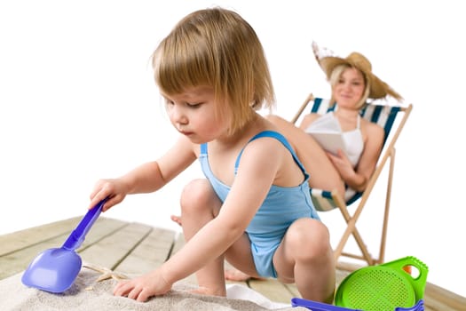 Beach - Young woman  with child