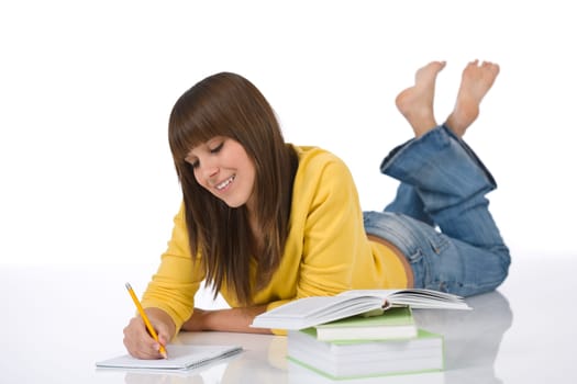 Happy female teenager with book