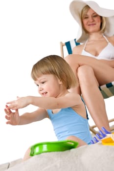 Beach - Young woman with child