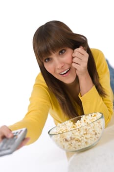 Female teenager watching television