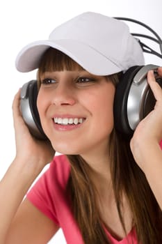 Happy female teenager enjoy music