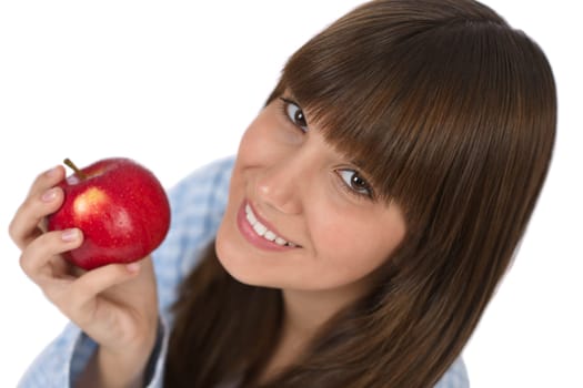 Happy teenager eating healthy apple