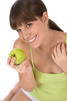 Happy teenager eating healthy apple