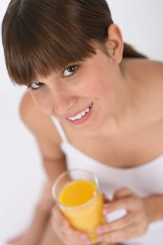 Female teenager with glass of juice