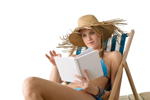Beach - Happy woman in bikini with book