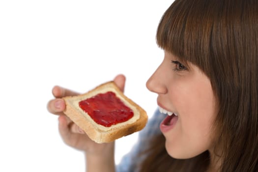 Happy teenager eating healthy toast