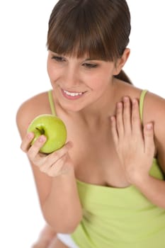 Happy teenager holding healthy apple