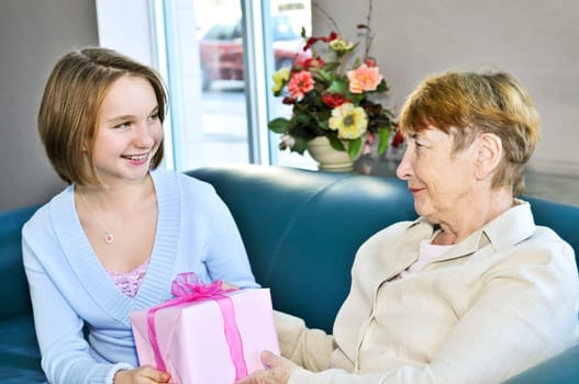 Granddaughter visiting grandmother