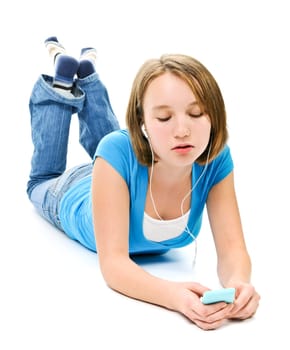 Teenage girl listening to music