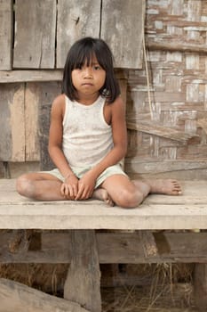Portrait of girl from Laos in poverty