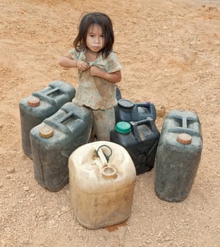asian kid with jerry can