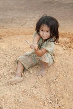 Portrait of girl from Laos in poverty