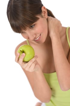 Happy teenager holding healthy apple