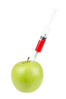 Green apple with syringe inserted