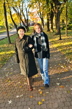 Granddaughter walking with grandmother