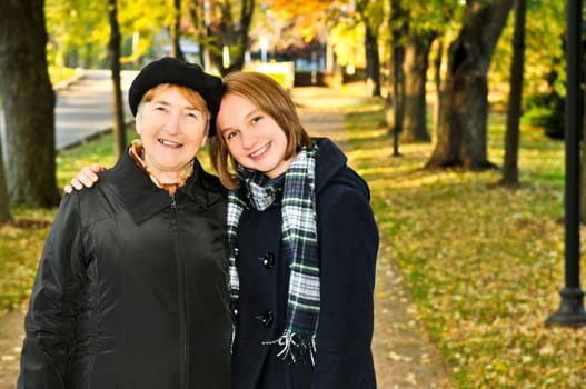 Granddaughter walking with grandmother