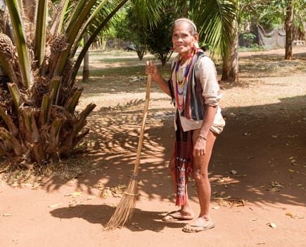 old man with broom