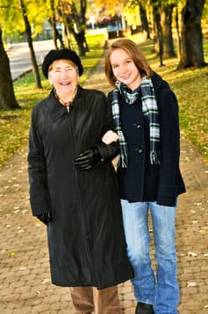 Granddaughter walking with grandmother