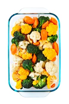 Raw vegetables in baking dish