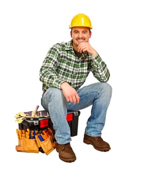 young handyman sit on his toolbox isolated on white