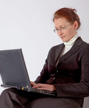 business woman walking with case