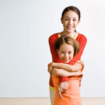 Sisters hugging
