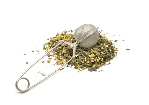 Herbal tea blend in tea tongs